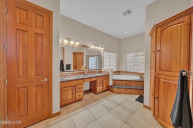 Welcome to 2620 Villa Palma, nestled in the highly sought-after on London Bridge Golf Course in Arizona - for sale on GolfHomes.com, golf home, golf lot