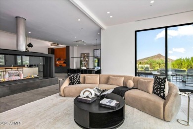 One of Desert Mountain's newer iconic homes is now available! on Desert Mountain Golf Club - Renegade Course in Arizona - for sale on GolfHomes.com, golf home, golf lot