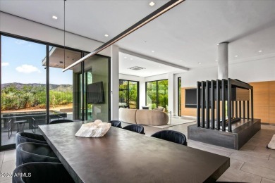 One of Desert Mountain's newer iconic homes is now available! on Desert Mountain Golf Club - Renegade Course in Arizona - for sale on GolfHomes.com, golf home, golf lot
