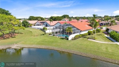 Welcome to your retreat in Boca Raton! This single-story home on Boca Woods Country Club in Florida - for sale on GolfHomes.com, golf home, golf lot