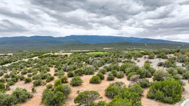 Nestled by a pristine golf course in the heart of a mountain on Paa-Ko Ridge Golf Club  in New Mexico - for sale on GolfHomes.com, golf home, golf lot