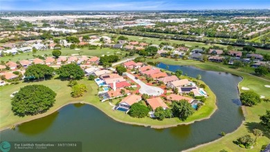 Welcome to your retreat in Boca Raton! This single-story home on Boca Woods Country Club in Florida - for sale on GolfHomes.com, golf home, golf lot