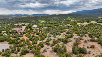 Nestled by a pristine golf course in the heart of a mountain on Paa-Ko Ridge Golf Club  in New Mexico - for sale on GolfHomes.com, golf home, golf lot