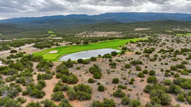 Nestled by a pristine golf course in the heart of a mountain on Paa-Ko Ridge Golf Club  in New Mexico - for sale on GolfHomes.com, golf home, golf lot