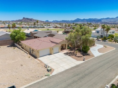 Welcome to 2620 Villa Palma, nestled in the highly sought-after on London Bridge Golf Course in Arizona - for sale on GolfHomes.com, golf home, golf lot