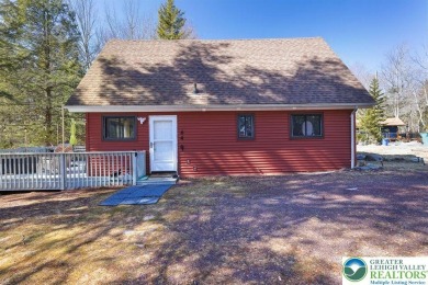 Don't let the outside fool you, this home feels more spacious on Pocono Farms Country Club in Pennsylvania - for sale on GolfHomes.com, golf home, golf lot
