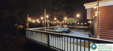 Don't let the outside fool you, this home feels more spacious on Pocono Farms Country Club in Pennsylvania - for sale on GolfHomes.com, golf home, golf lot