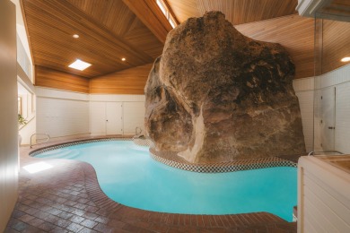 Carved into the side of the Bloomington Bluff, this 7,258 sq ft on Bloomington Country Club in Utah - for sale on GolfHomes.com, golf home, golf lot