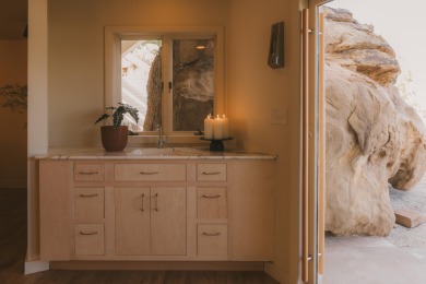 Carved into the side of the Bloomington Bluff, this 7,258 sq ft on Bloomington Country Club in Utah - for sale on GolfHomes.com, golf home, golf lot