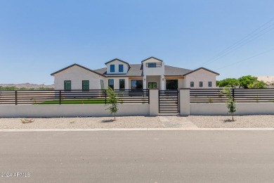 Experience luxury in this custom-built 7-bed, 6-bath estate on a on Seville Golf and Country Club in Arizona - for sale on GolfHomes.com, golf home, golf lot