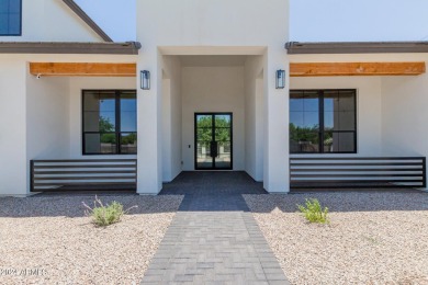 Experience luxury in this custom-built 7-bed, 6-bath estate on a on Seville Golf and Country Club in Arizona - for sale on GolfHomes.com, golf home, golf lot