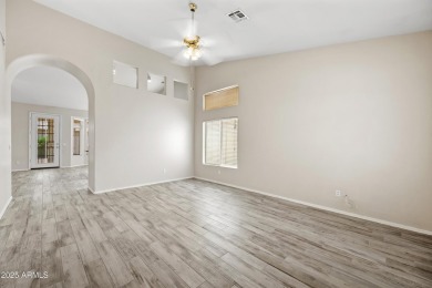 This beautifully updated home offers a spacious layout with a on Palm Valley Golf Club  in Arizona - for sale on GolfHomes.com, golf home, golf lot