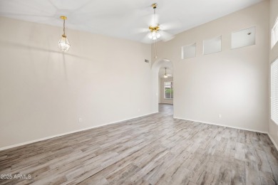 This beautifully updated home offers a spacious layout with a on Palm Valley Golf Club  in Arizona - for sale on GolfHomes.com, golf home, golf lot