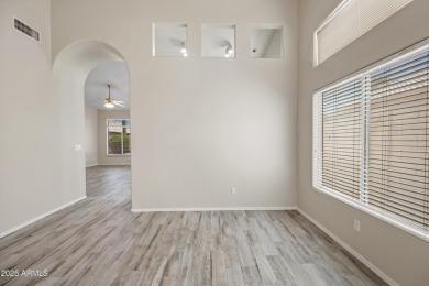 This beautifully updated home offers a spacious layout with a on Palm Valley Golf Club  in Arizona - for sale on GolfHomes.com, golf home, golf lot