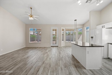 This beautifully updated home offers a spacious layout with a on Palm Valley Golf Club  in Arizona - for sale on GolfHomes.com, golf home, golf lot