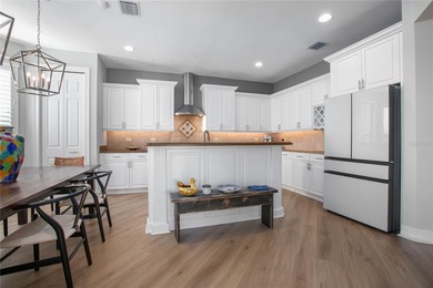 Award-winning ISSA custom home perfectly situated on a quiet on Victoria Hills Golf Club in Florida - for sale on GolfHomes.com, golf home, golf lot