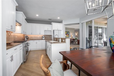 Award-winning ISSA custom home perfectly situated on a quiet on Victoria Hills Golf Club in Florida - for sale on GolfHomes.com, golf home, golf lot