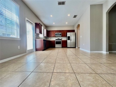 Live in this beautiful townhome in the desirable community of on Harmony Golf Preserve in Florida - for sale on GolfHomes.com, golf home, golf lot