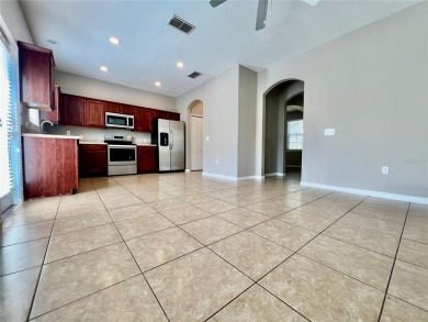 Live in this beautiful townhome in the desirable community of on Harmony Golf Preserve in Florida - for sale on GolfHomes.com, golf home, golf lot