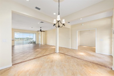 This distinguished Johnstown model features remarkable sunsets on Eagle Ridge At Spruce Creek Country Club in Florida - for sale on GolfHomes.com, golf home, golf lot