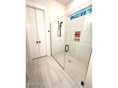 Well maintained  home in the premier gated community RiverSea on Carolina National Golf Club in North Carolina - for sale on GolfHomes.com, golf home, golf lot