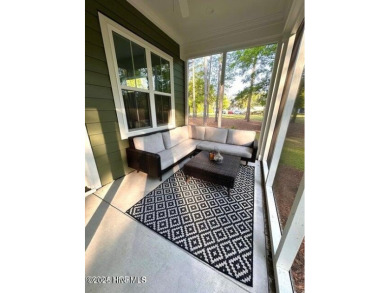 Well maintained  home in the premier gated community RiverSea on Carolina National Golf Club in North Carolina - for sale on GolfHomes.com, golf home, golf lot