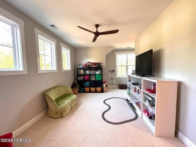 Well maintained  home in the premier gated community RiverSea on Carolina National Golf Club in North Carolina - for sale on GolfHomes.com, golf home, golf lot