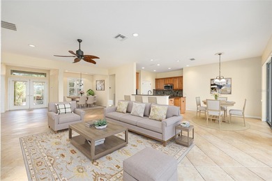 This distinguished Johnstown model features remarkable sunsets on Eagle Ridge At Spruce Creek Country Club in Florida - for sale on GolfHomes.com, golf home, golf lot