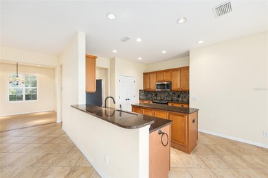 This distinguished Johnstown model features remarkable sunsets on Eagle Ridge At Spruce Creek Country Club in Florida - for sale on GolfHomes.com, golf home, golf lot