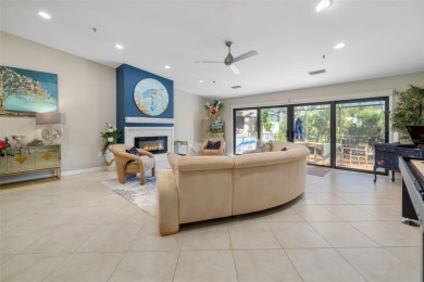 This expansive villa offers the space and comfort of a private on Longboat Key Golf Club Resort in Florida - for sale on GolfHomes.com, golf home, golf lot