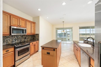 This distinguished Johnstown model features remarkable sunsets on Eagle Ridge At Spruce Creek Country Club in Florida - for sale on GolfHomes.com, golf home, golf lot