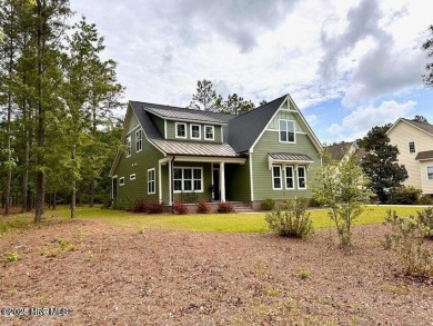 Well maintained  home in the premier gated community RiverSea on Carolina National Golf Club in North Carolina - for sale on GolfHomes.com, golf home, golf lot