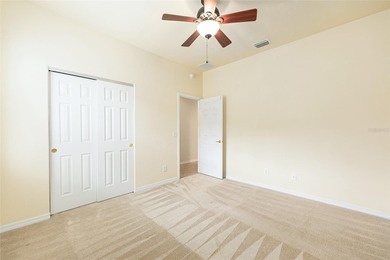 This distinguished Johnstown model features remarkable sunsets on Eagle Ridge At Spruce Creek Country Club in Florida - for sale on GolfHomes.com, golf home, golf lot