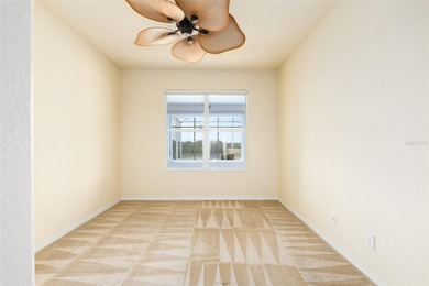 This distinguished Johnstown model features remarkable sunsets on Eagle Ridge At Spruce Creek Country Club in Florida - for sale on GolfHomes.com, golf home, golf lot