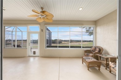 This distinguished Johnstown model features remarkable sunsets on Eagle Ridge At Spruce Creek Country Club in Florida - for sale on GolfHomes.com, golf home, golf lot