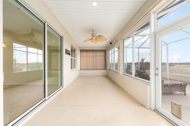 This distinguished Johnstown model features remarkable sunsets on Eagle Ridge At Spruce Creek Country Club in Florida - for sale on GolfHomes.com, golf home, golf lot