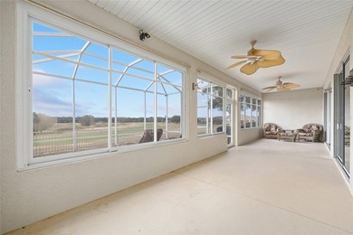 This distinguished Johnstown model features remarkable sunsets on Eagle Ridge At Spruce Creek Country Club in Florida - for sale on GolfHomes.com, golf home, golf lot