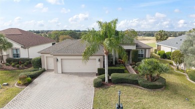 This distinguished Johnstown model features remarkable sunsets on Eagle Ridge At Spruce Creek Country Club in Florida - for sale on GolfHomes.com, golf home, golf lot