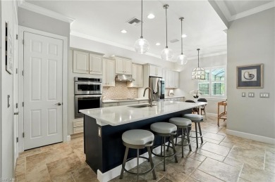 This Stunning home features a Gorgeous heated saltwater pool on The Plantation Golf and Country Club in Florida - for sale on GolfHomes.com, golf home, golf lot
