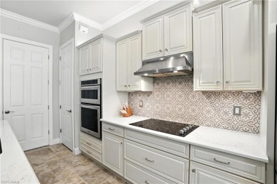 This Stunning home features a Gorgeous heated saltwater pool on The Plantation Golf and Country Club in Florida - for sale on GolfHomes.com, golf home, golf lot
