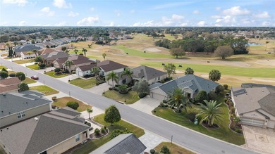 This distinguished Johnstown model features remarkable sunsets on Eagle Ridge At Spruce Creek Country Club in Florida - for sale on GolfHomes.com, golf home, golf lot