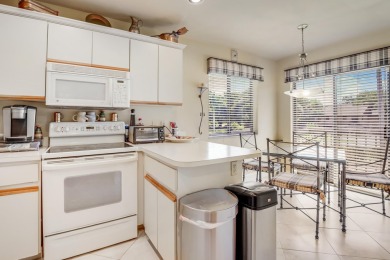 Step into this light-filled 2-bedroom (+Den), 2-bath condo in on Fountains Golf and Country Club in Florida - for sale on GolfHomes.com, golf home, golf lot