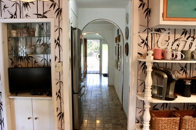 You've driven past this iconic home so many times! Finally, your on Waikoloa Village Golf Club in Hawaii - for sale on GolfHomes.com, golf home, golf lot