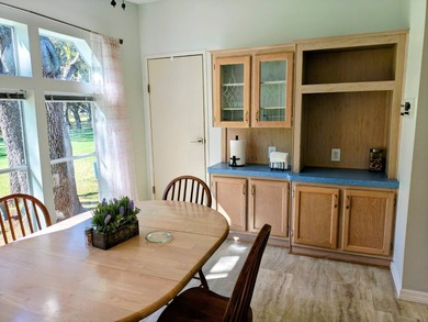 This spacious 3 bdrm,2 bath PALM HARBOR is completely furnished on Southport Springs Golf Club in Florida - for sale on GolfHomes.com, golf home, golf lot