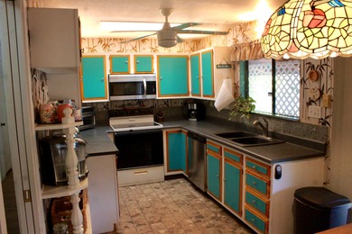 You've driven past this iconic home so many times! Finally, your on Waikoloa Village Golf Club in Hawaii - for sale on GolfHomes.com, golf home, golf lot