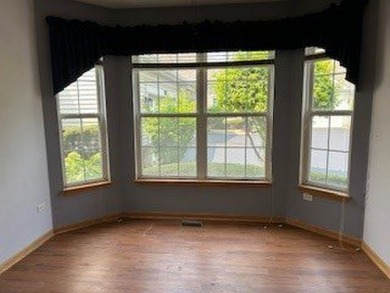 Welcome to this beautifully UPDATED 1267 sq. ft., 2-bedroom, 1 on The Links at Carillon in Illinois - for sale on GolfHomes.com, golf home, golf lot