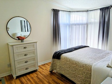 This spacious 3 bdrm,2 bath PALM HARBOR is completely furnished on Southport Springs Golf Club in Florida - for sale on GolfHomes.com, golf home, golf lot