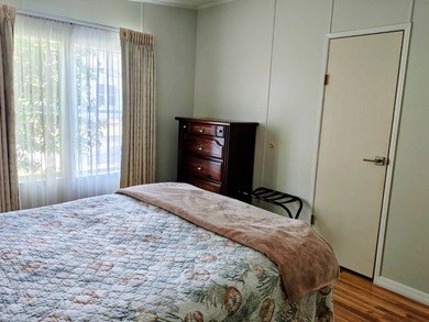 This spacious 3 bdrm,2 bath PALM HARBOR is completely furnished on Southport Springs Golf Club in Florida - for sale on GolfHomes.com, golf home, golf lot