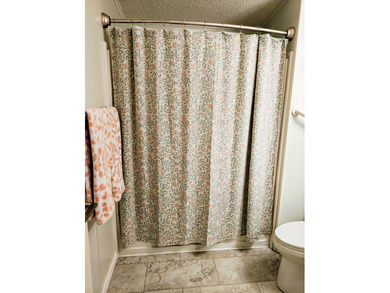 This spacious 3 bdrm,2 bath PALM HARBOR is completely furnished on Southport Springs Golf Club in Florida - for sale on GolfHomes.com, golf home, golf lot