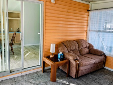 This spacious 3 bdrm,2 bath PALM HARBOR is completely furnished on Southport Springs Golf Club in Florida - for sale on GolfHomes.com, golf home, golf lot